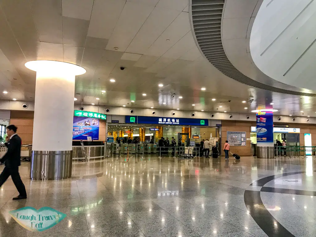 malev station pudong airport shanghai china - laugh travel eat