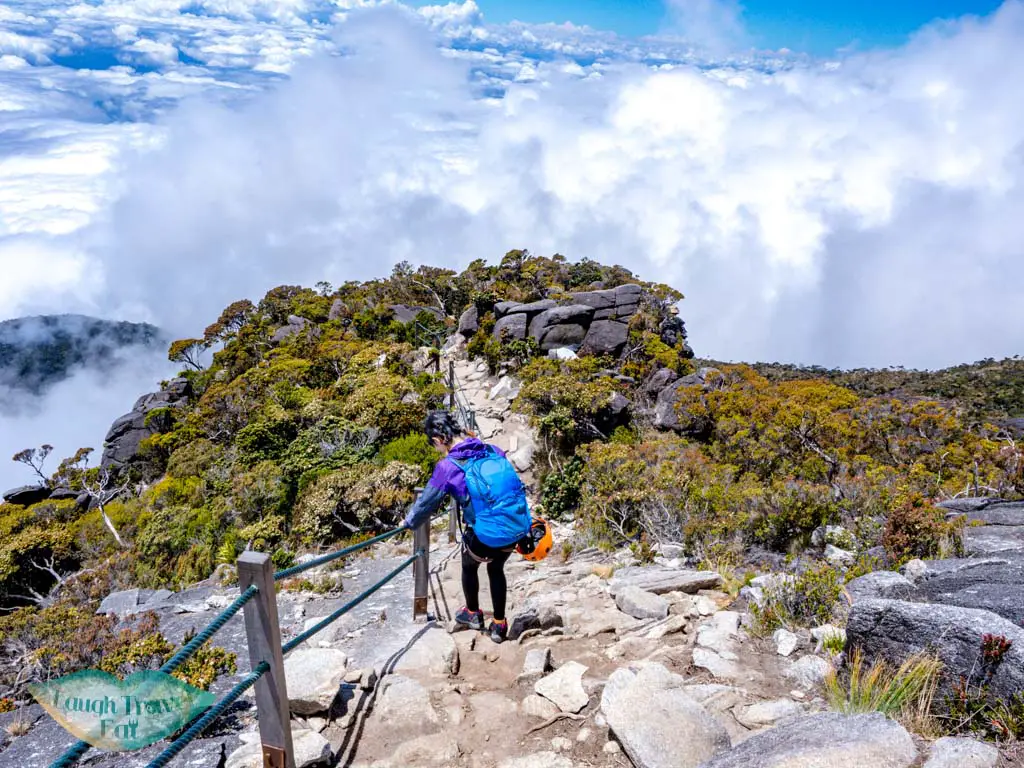 rocky-steps-down-from-summit-mount-kinabalu-sabah-malaysia-laugh-travel-eat