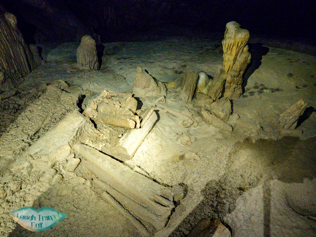 fallen stalagmites paradise cave phong nha vietnam - laugh travel eat