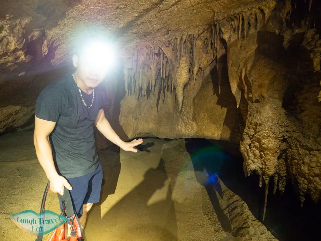 loc giving us a brief talk paradise cave phong nha vietnam - laugh travel eat