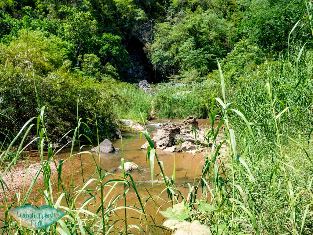 riverside by tra ang cave phong nha vietnam - laugh travel eat