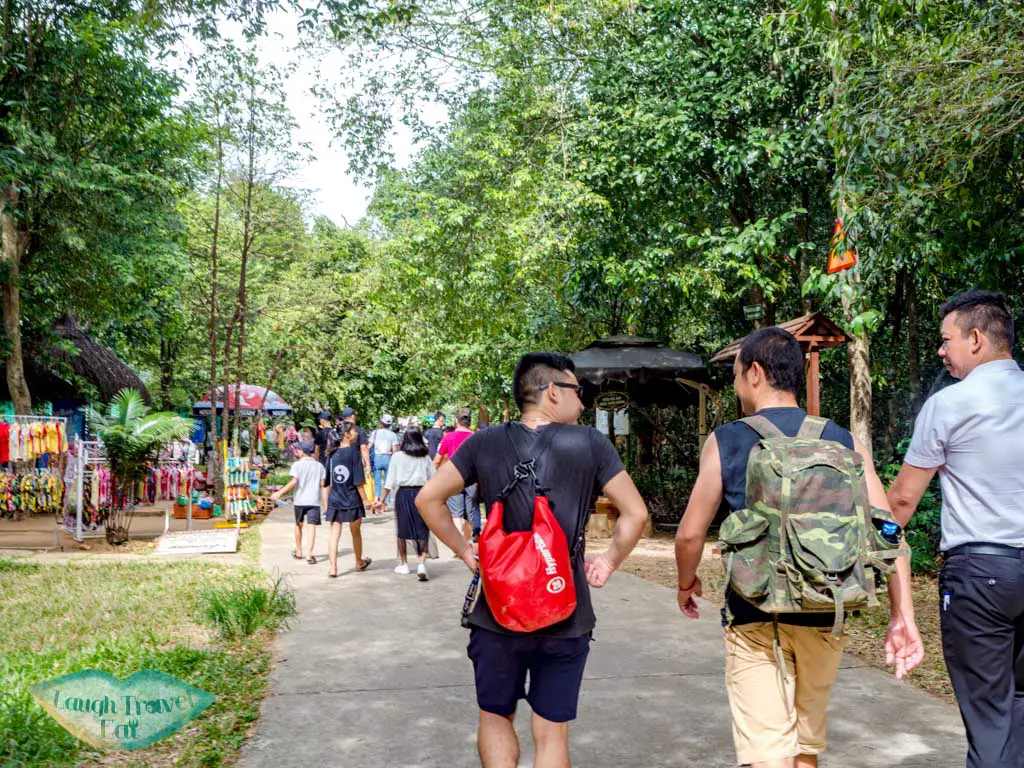 walking to paradise cave phong nha vietnam - laugh travel eat