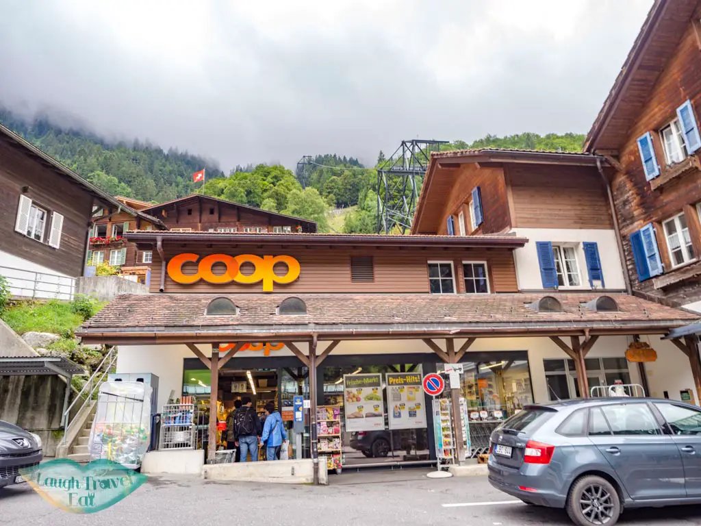 co op across Lauterbrunnen station Switzerland - laugh travel eat