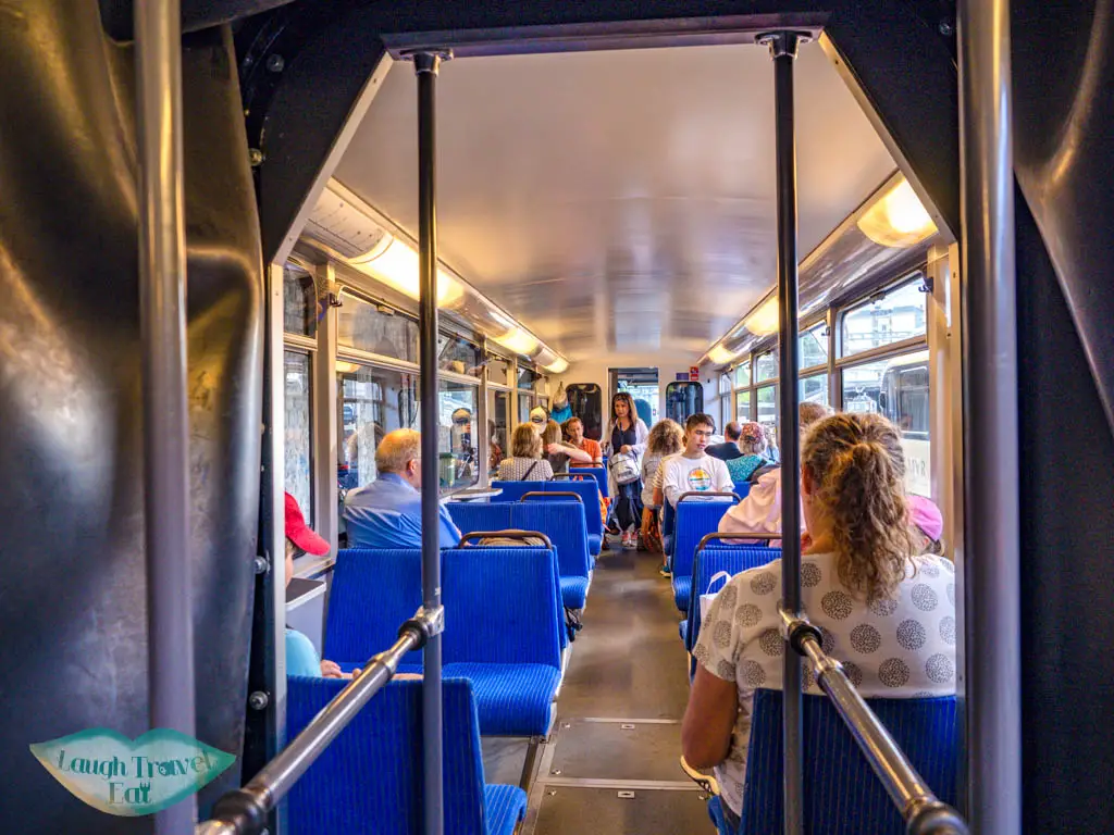 inside cogwheel train up to Rocher de Nayes Montreux switzerland - laugh travel eat