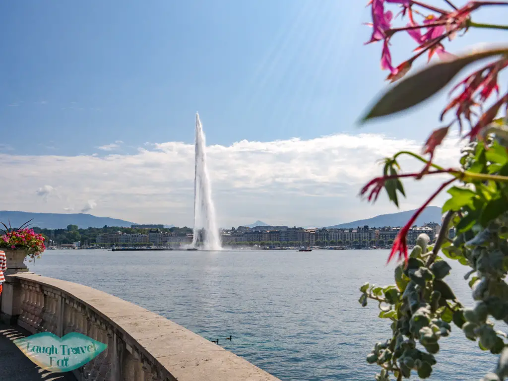 jet d'eau view from across geneva switzerland - laugh travel eat