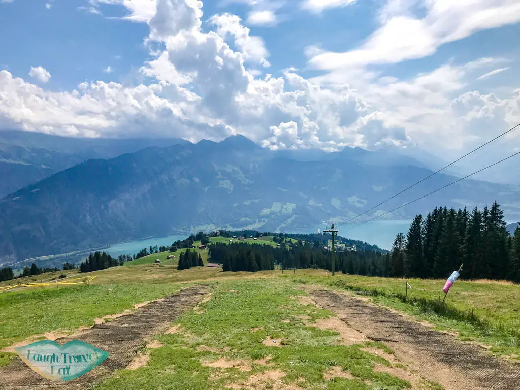 jump off point from the mountains paragliding interlaken Switzerland - laugh travel eat
