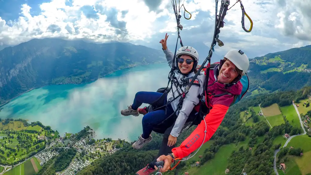 paragliding over interlaken Switzerland - laugh travel eat