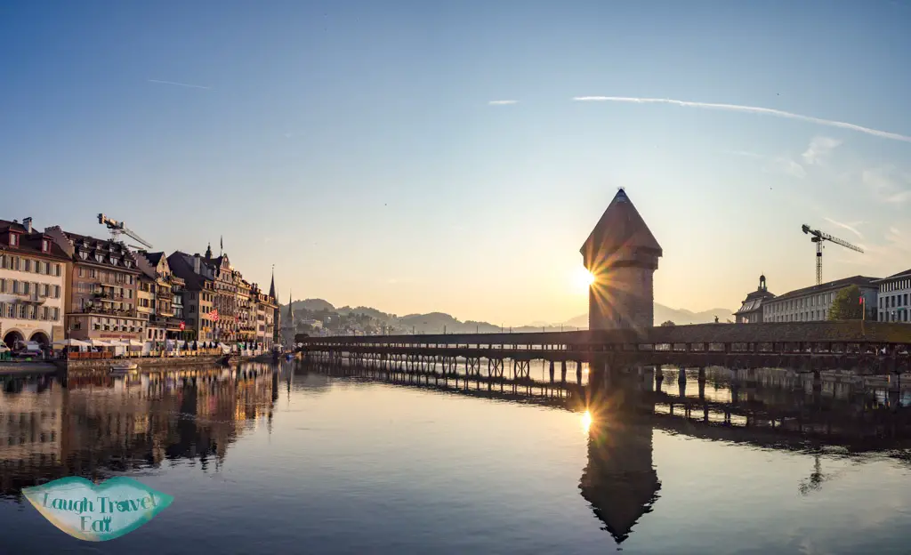 sunset Chapel bridge lucerne switzerland - laugh travel eat