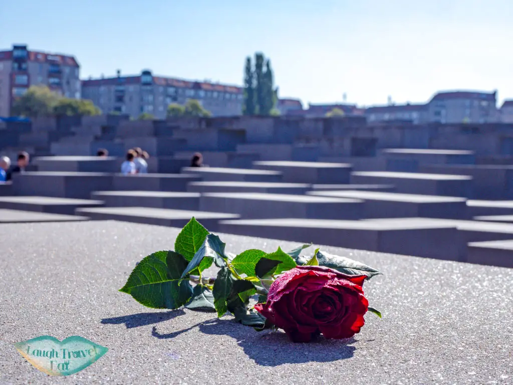 a rose on memorial to the murdered Jews berlin germany - laugh travel eat