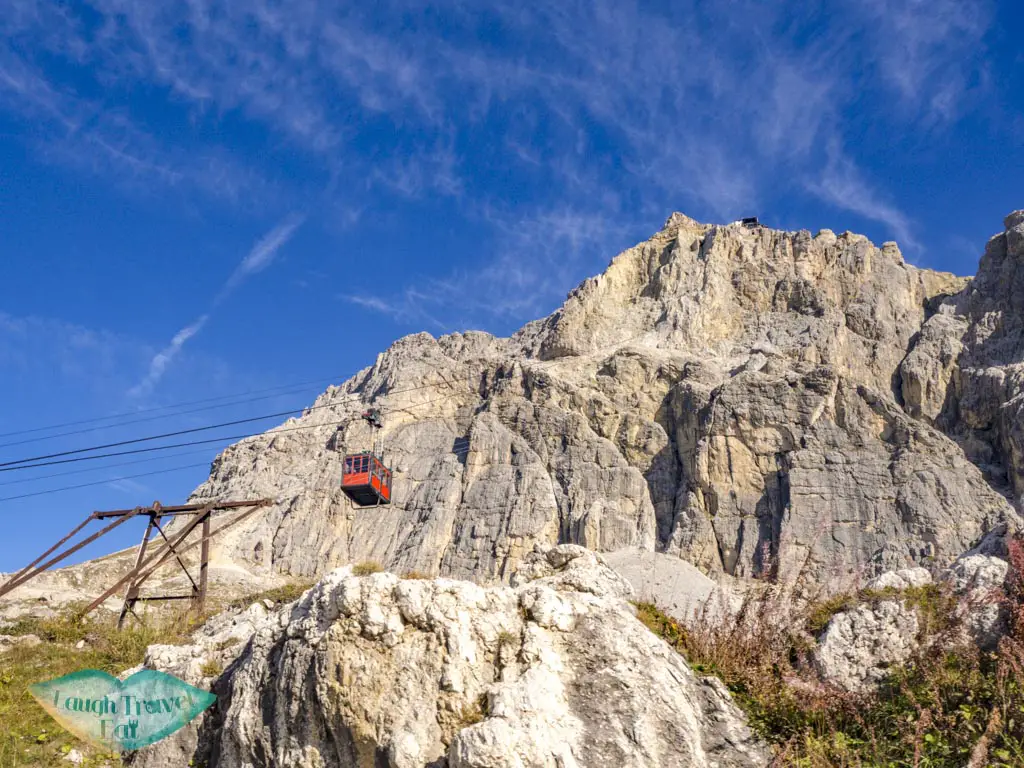 cable car up to lagazuoi cortina d'ampezzo italy - laugh travel eat