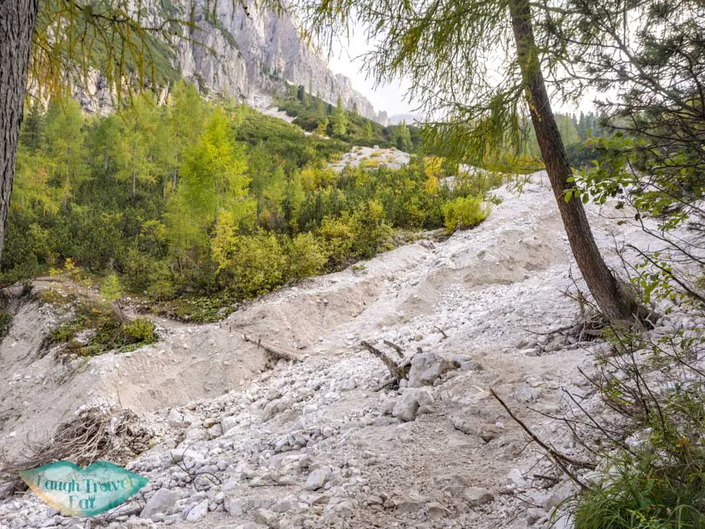 crossing the first stream lake sorapis hike cortina d'ampezzo dolomites italy - laugh travel eat