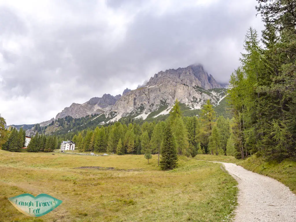 looking back at trail start lake sorapis hike cortina d'ampezzo dolomites italy - laugh travel eat