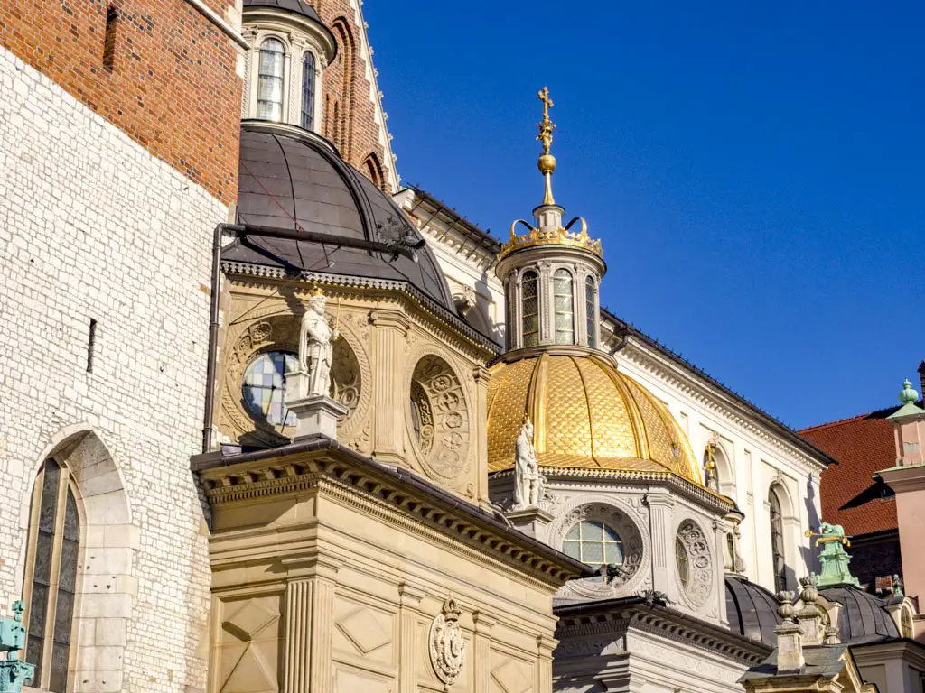 golden dom wawel cathedral wawel hill krakow poland - laugh travel eat