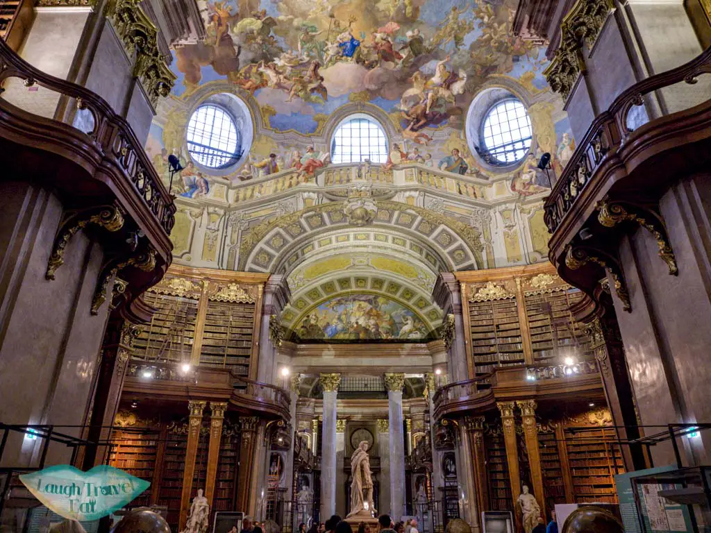 statue hall austria national library vienna austria - laugh travel eat