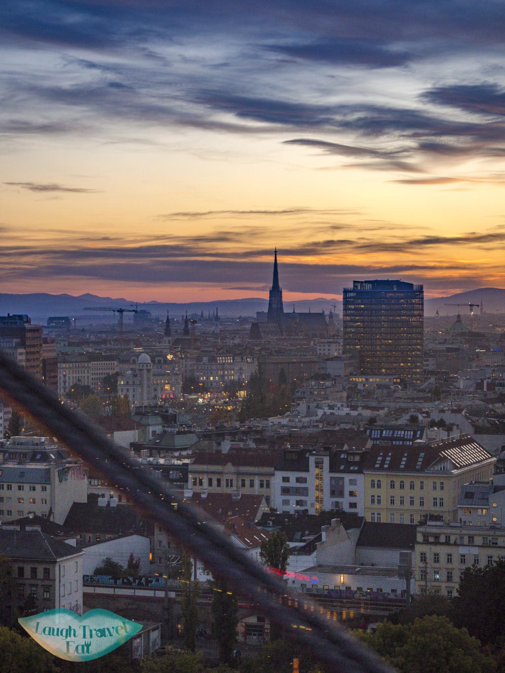 sunset view from ferris wheel vienna austria - laugh travel eat
