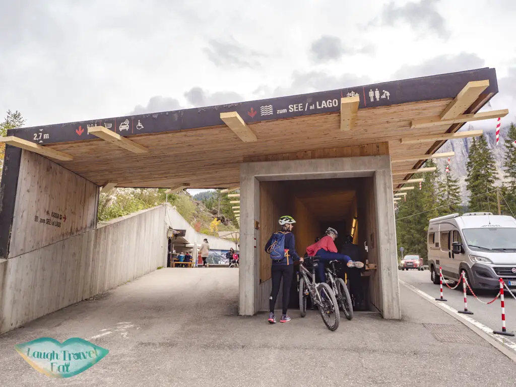 tunnel to Lake Carezza dolomites italy - laugh travel eat