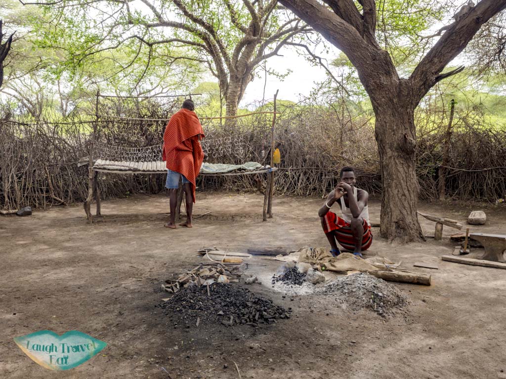blacksmith datoga village tanzania africa - laugh travel eat