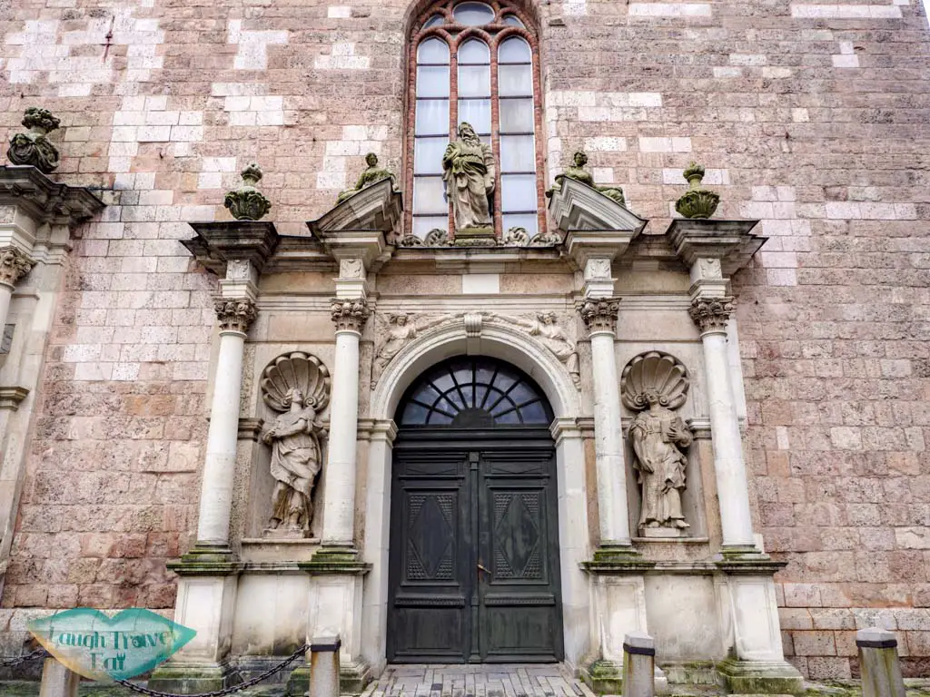 door of church of st peter riga latvia - laugh travel eat
