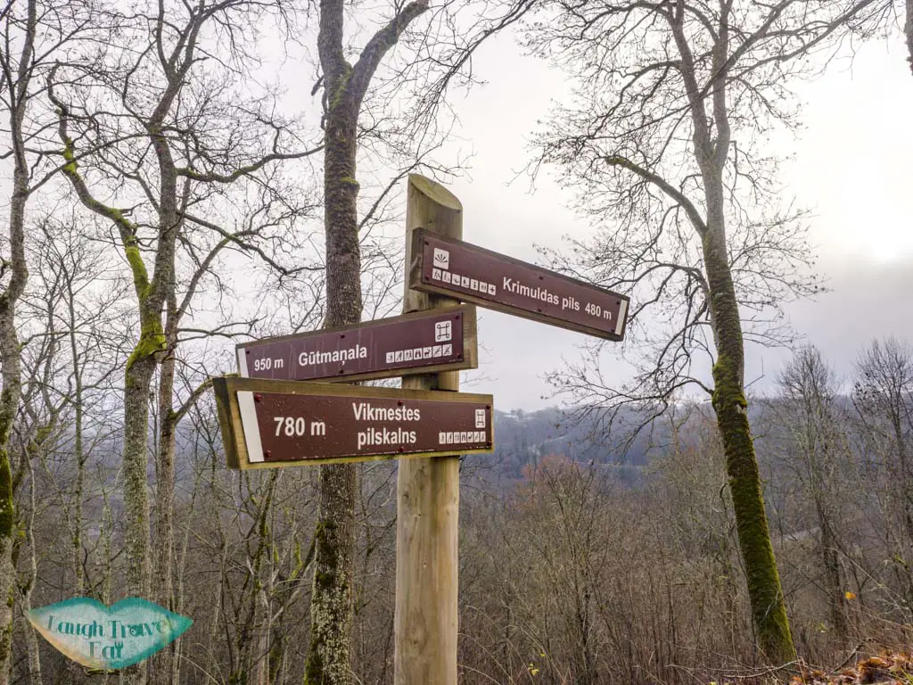hiking signpost gauja national park latvia - laugh travel eat