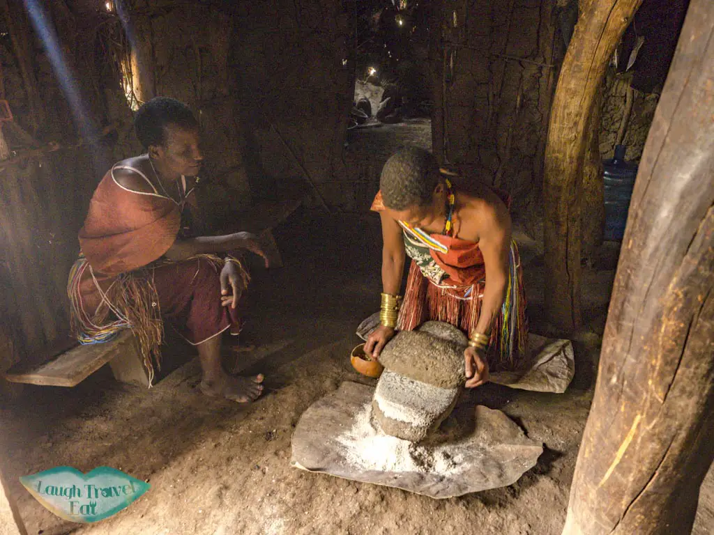 maze grinding datoga village tanzania africa - laugh travel eat