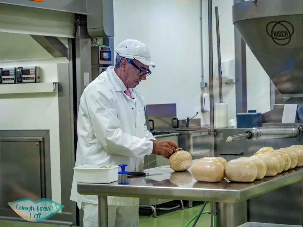 mortadella being made FICO eatly bologna italy - laugh travel eat