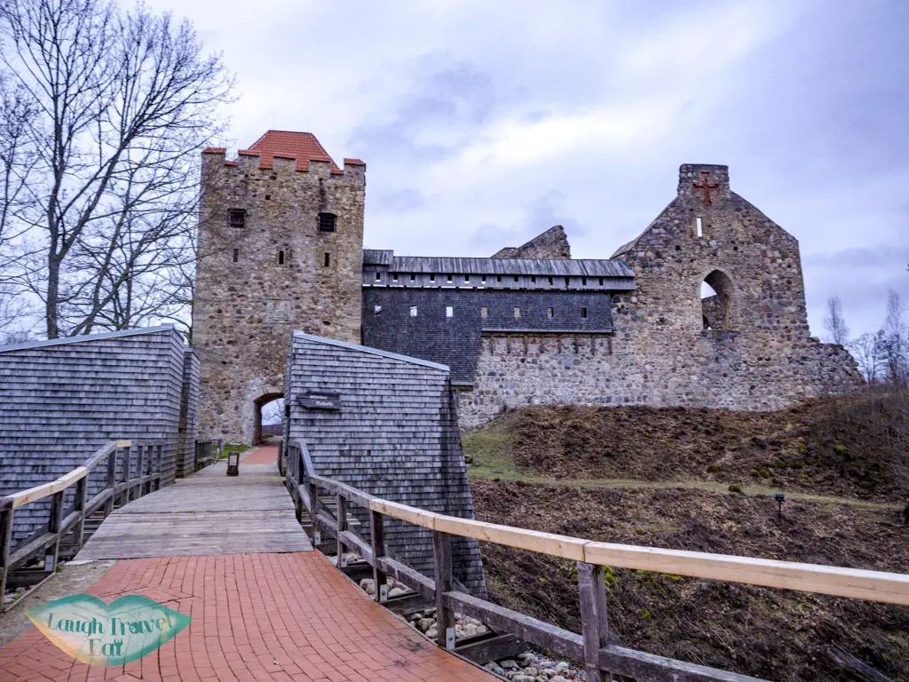 sigulda medieval castle gauja national park latvia - laugh travel eat