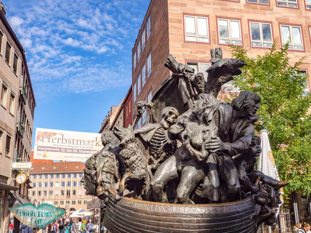 Narrenschiff fountain nuremberg germany - laugh travel eat
