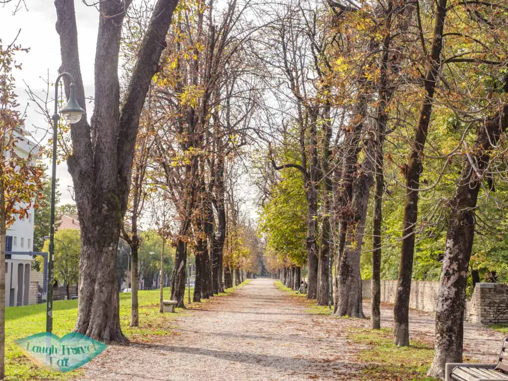 park on the wall treviso veneto italy - laugh travel eat