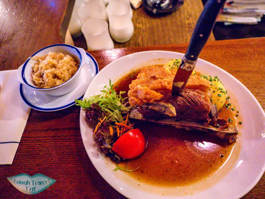 roast pork shoulder alte kuch'n nuremberg germany - laugh travel eat