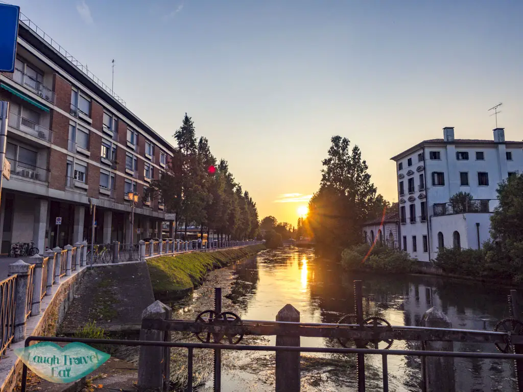 sunset near the train station treviso veneto venice - laugh travel eat