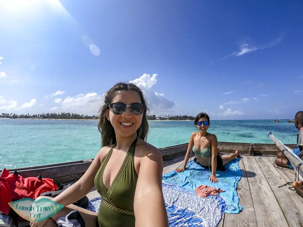 tanning on Mnemba snorkeling boat nungwi zanzibar tanzania - laugh travel eat