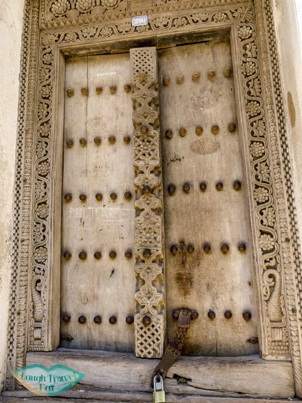 traditional door with lock stone town zanzibar - laugh travel eat