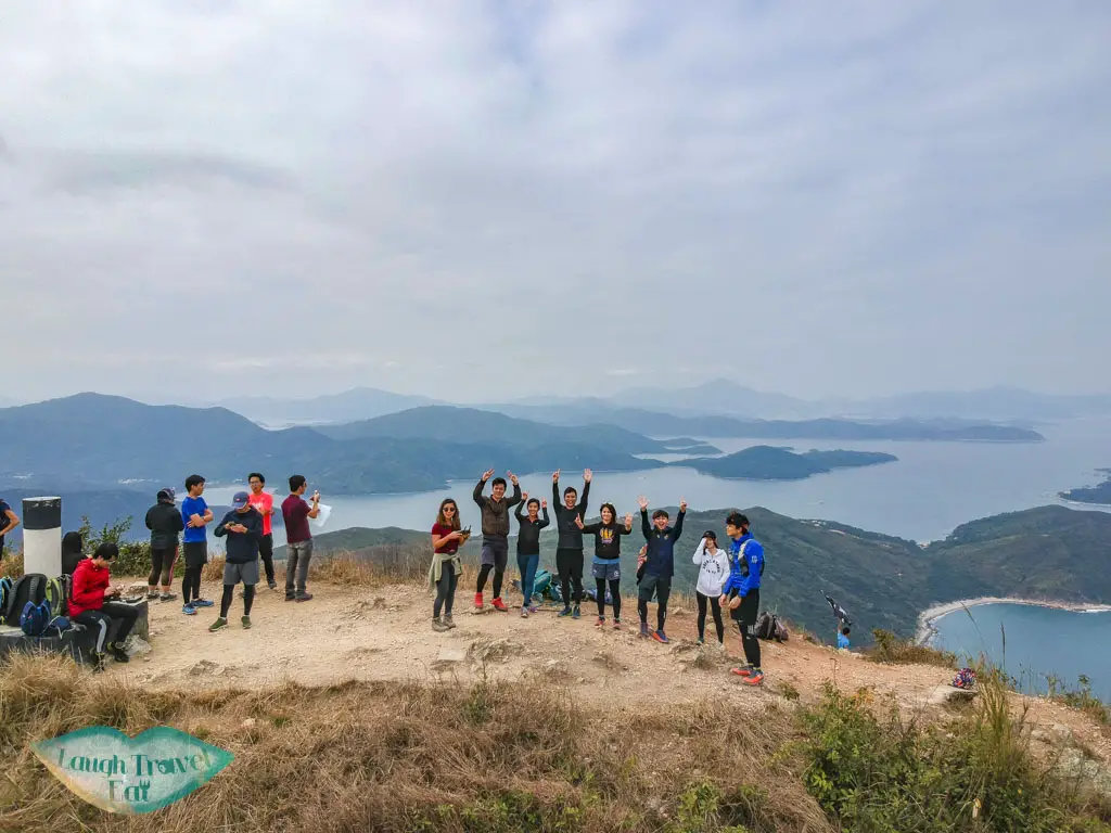 drone shot on top of sharp peak sai kung hong kong - laugh travel eat