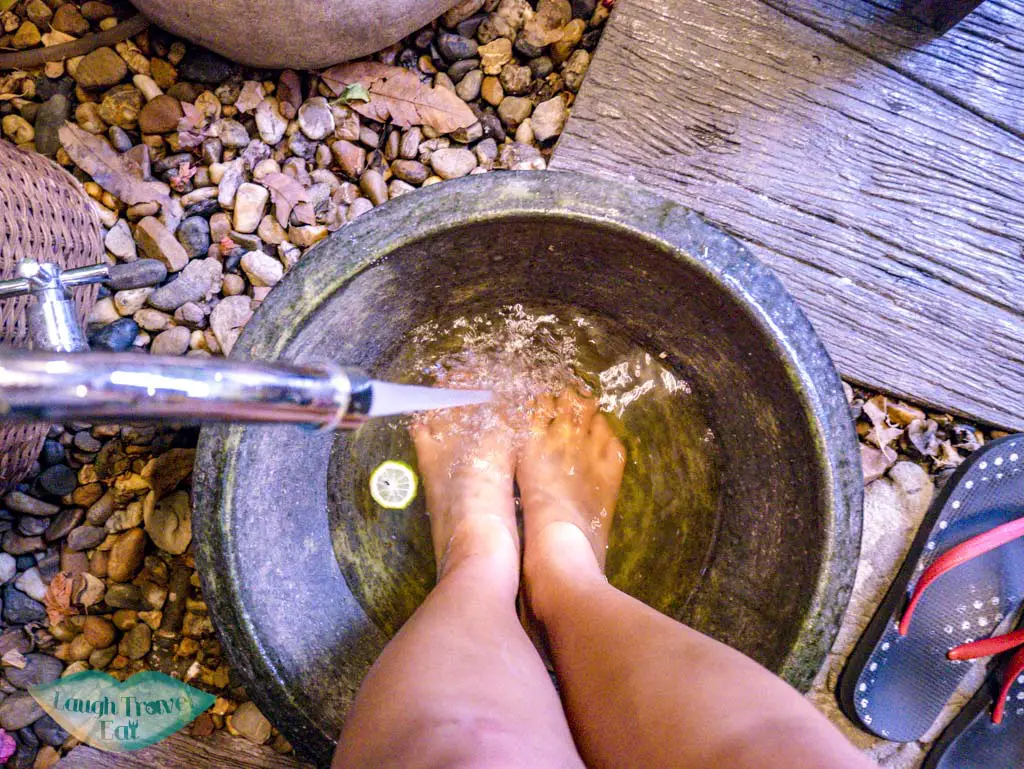 foot bath at lila thai massage chiang mai thailand - laugh travel eat
