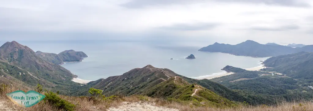 panorama of beaches on trail up to sharp peak sai kung hong kong - laugh travel eat