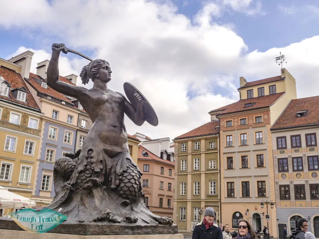 warrior mermaid old town warsaw poland - laugh travel eat