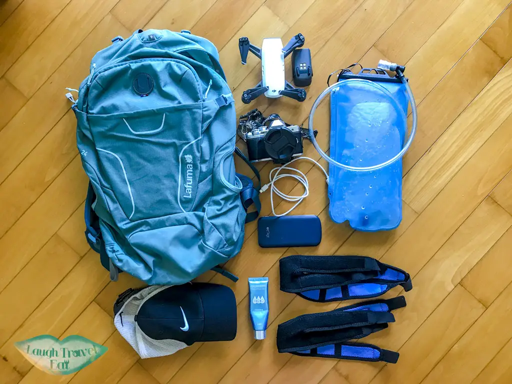 hiking essentials day pack - laugh travel eat