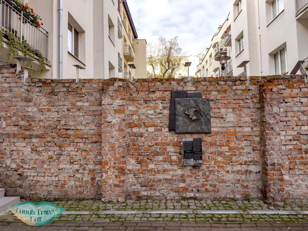 jewish ghetto wall warsaw poland - laugh travel eat