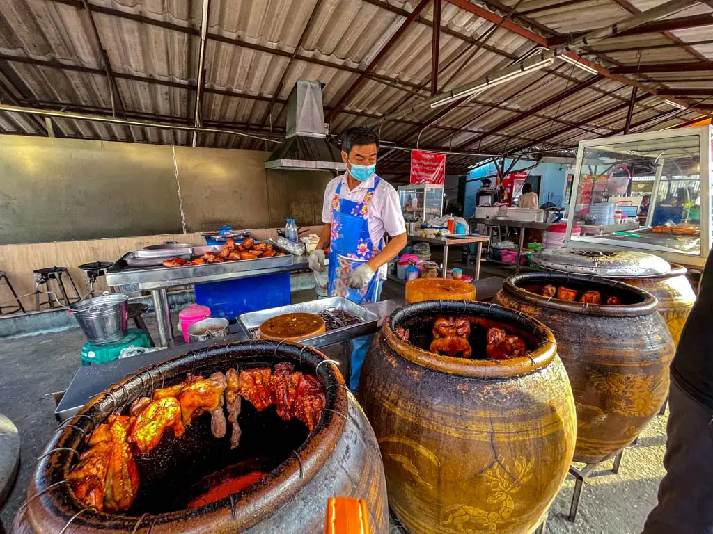 neng with his earthen jars northern flavours a chefs tour chiang mai thailand - laugh travel eat