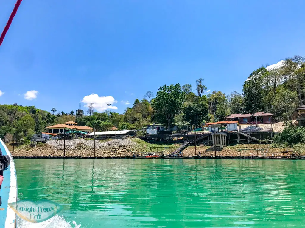 back to pier cheow lan lake khao sok thailand - laugh travel eat