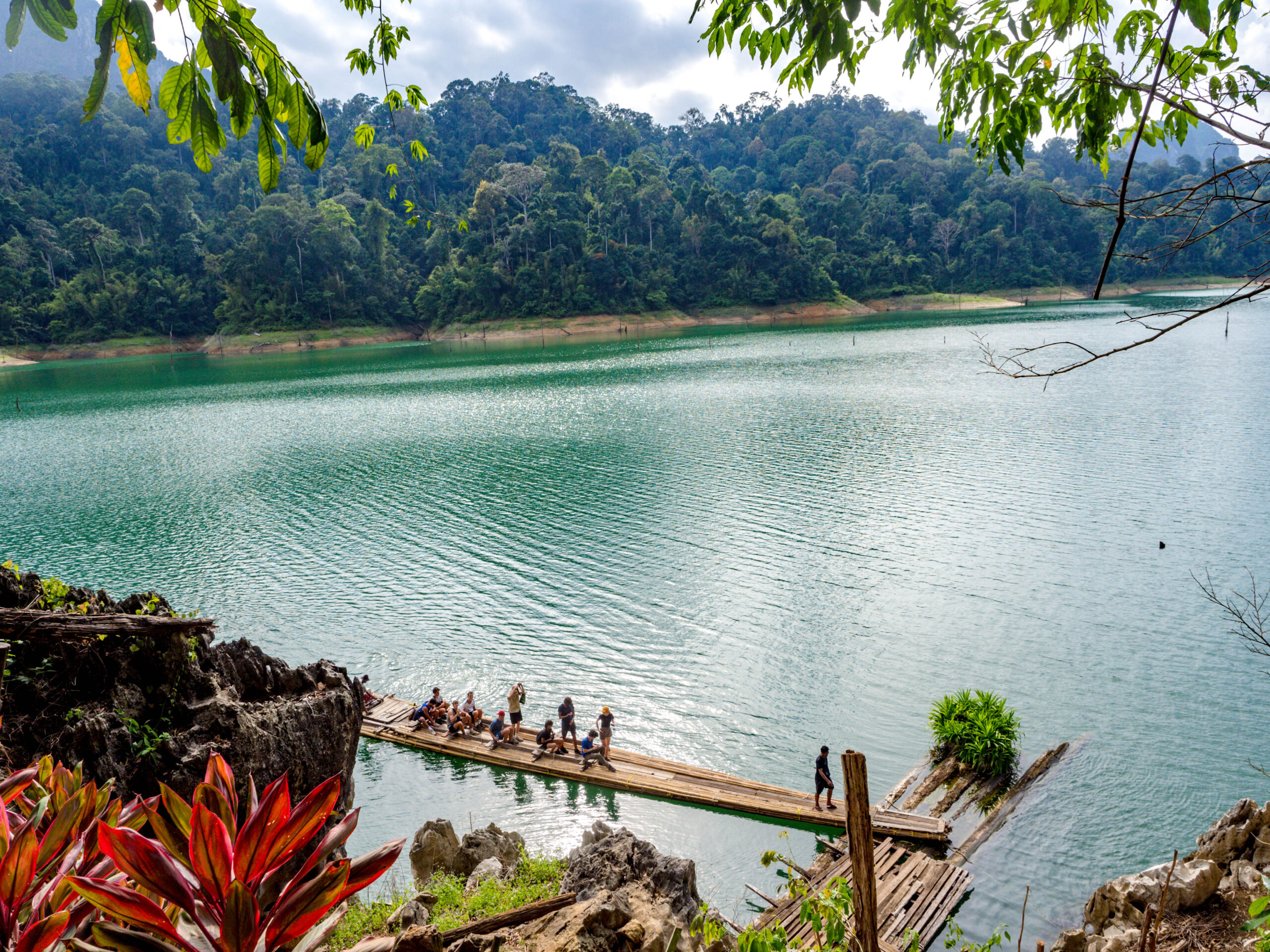 bamboo raft to coral cave hike cheow lan lake khao sok thailand laugh travel eat