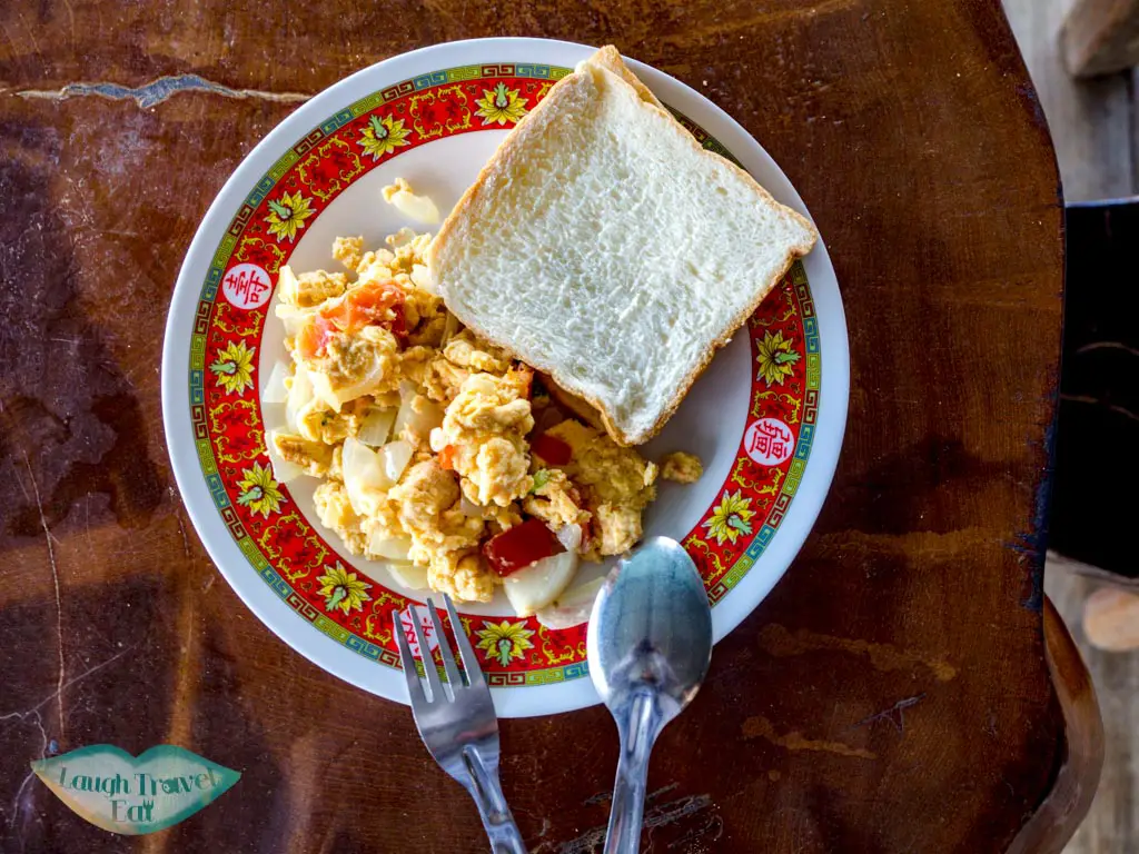 breakfast smiley lake house cheow lan lake khao sok thailand - laugh travel eat