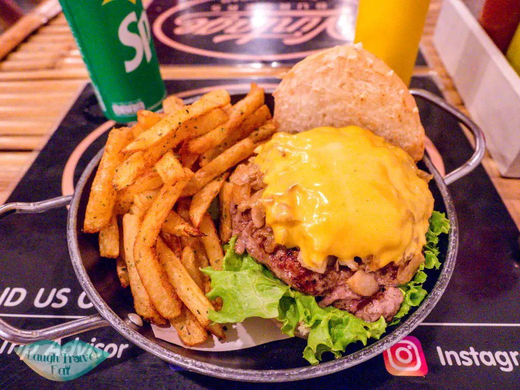 burger at vintage burger koh phangan thailand - laugh travel eat