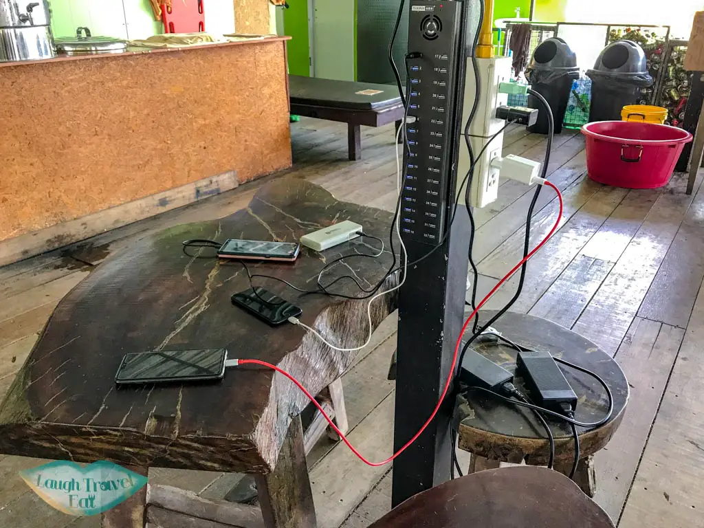 charging station smiley lake house cheow lan lake khao sok thailand - laugh travel eat