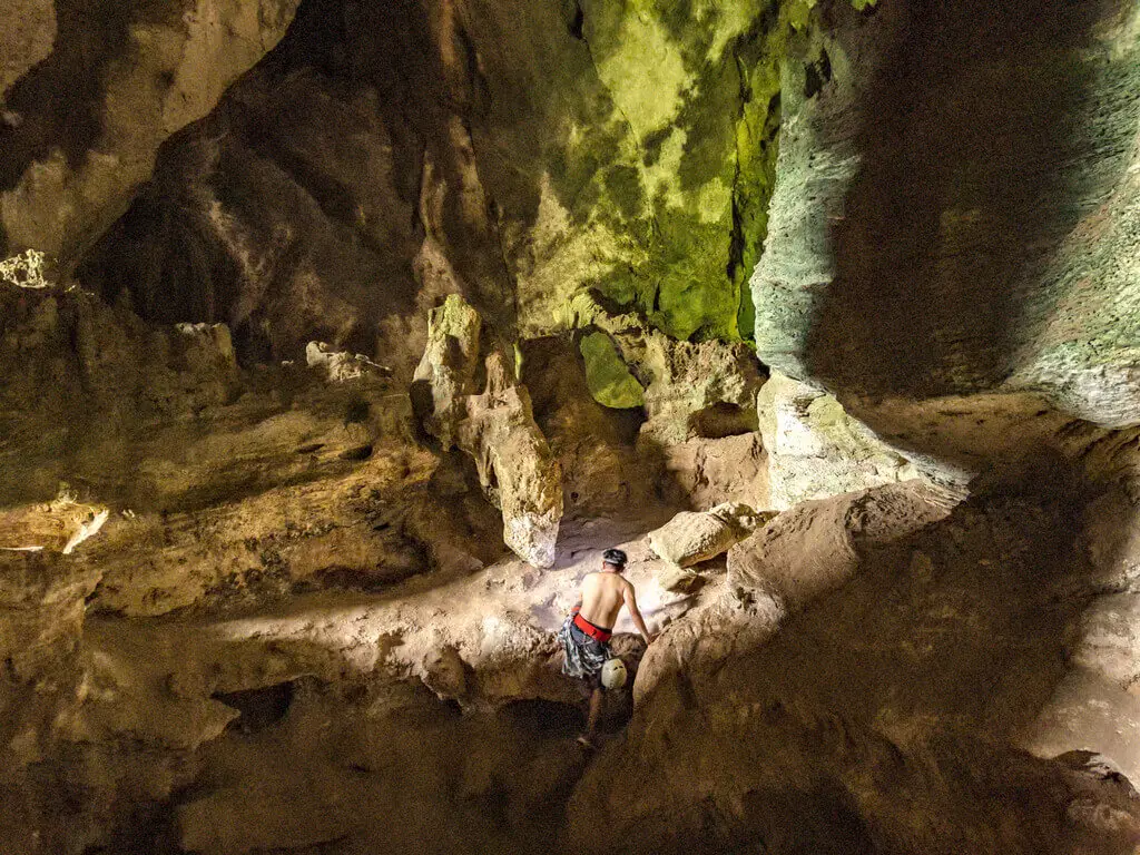 going up to bat cave rock climbing railey krabi thailand - laugh travel eat