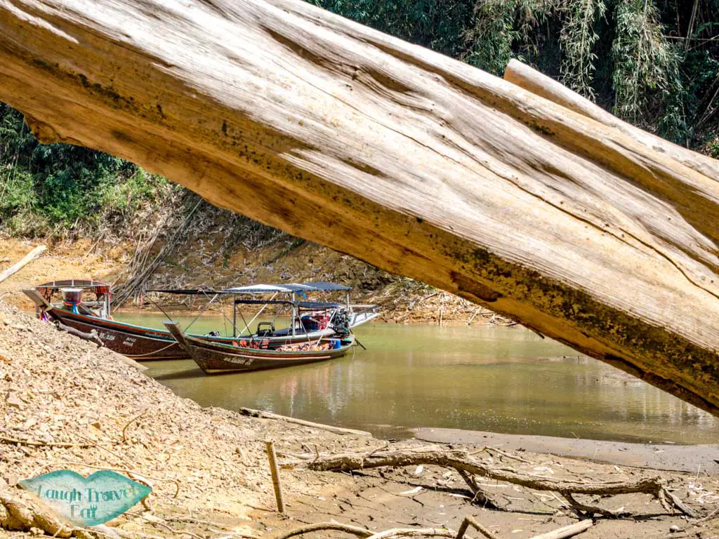hike to nam talu cave longtail boat cheow lan lake khao sok thailand - laugh travel eat