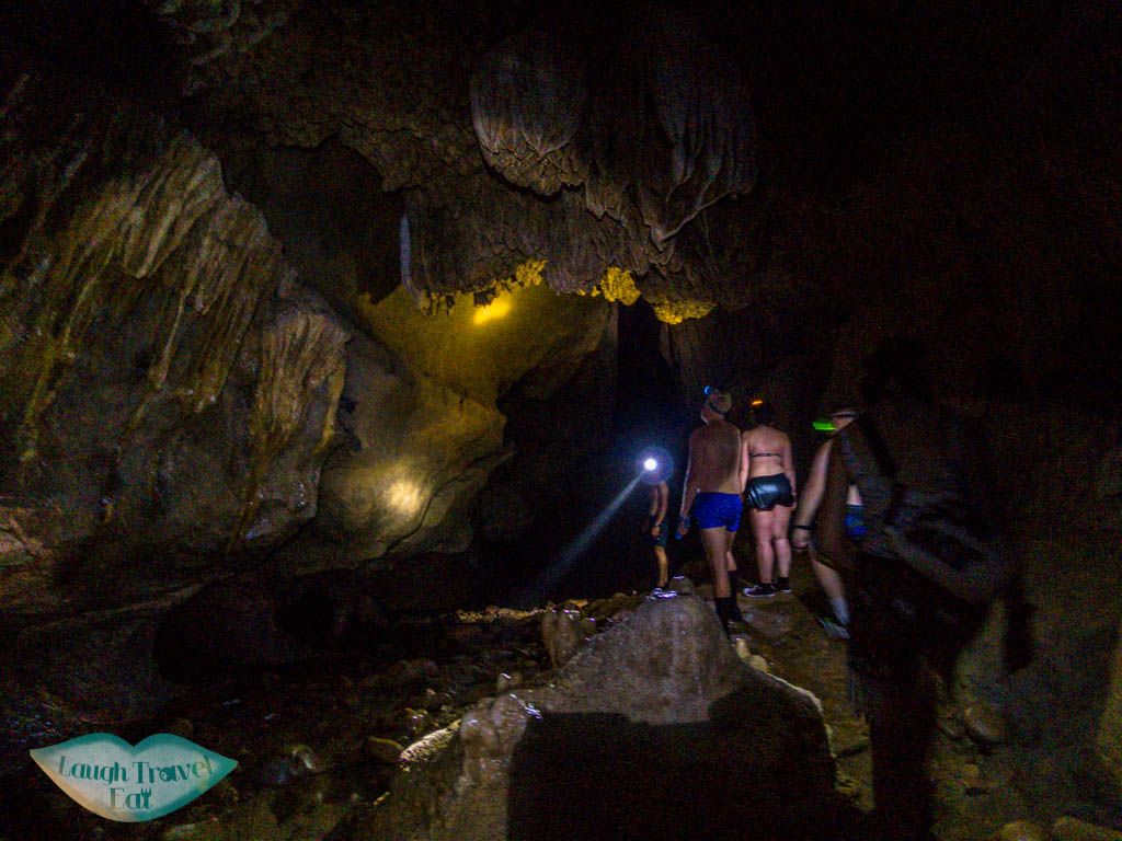 inside nam talu cave longtail boat cheow lan lake khao sok thailand - laugh travel eat