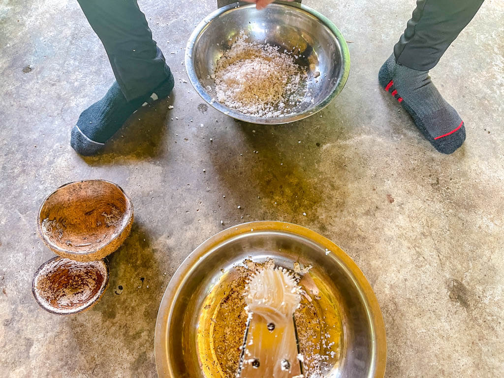 making coconut milk rungfah farm stay khao sok lake khao sok national park Thailand - laugh travel eat