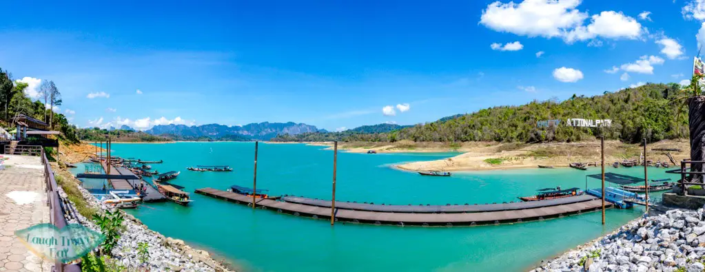 pier at ratchaprapha dam cheow lan lake khao sok thailand - laugh travel eat
