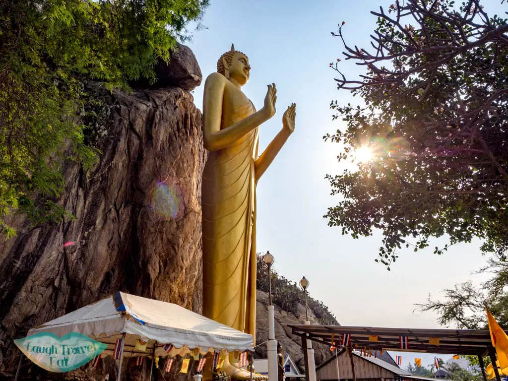 standing buddha chopstick hill hua hin thailand - laugh travel eat